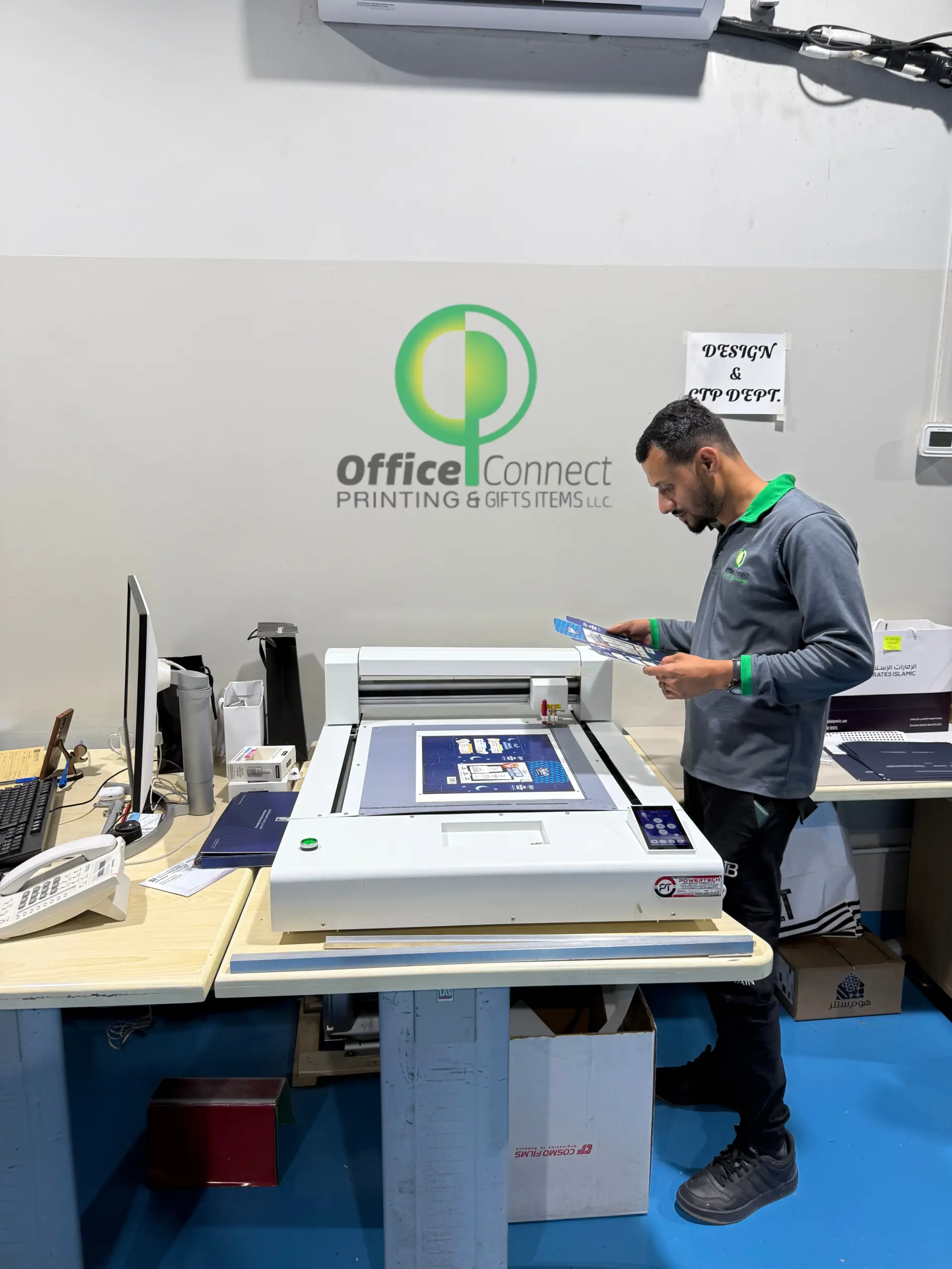 Professional printing services in Dubai showing print production and finishing process